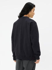 TNFロゴヘザースウェットクルー（ユニセックス）