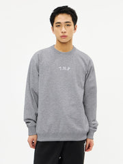 TNFロゴヘザースウェットクルー（ユニセックス）